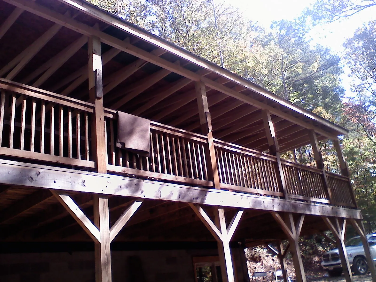 Timber framing under a new elevated porch and deck — Roof Leak Repair in Francestown by Roofing Brothers